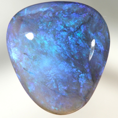 SOLID BLACK CRYSTAL OPAL Lustrous colours of gold green turquoise to blue and purple